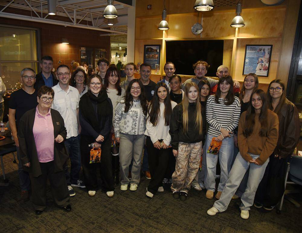 A delegation of 17 high school students and three teachers from Mercer Islands sister city, Thonon Les Bains, France, arrived in town on Oct. 23, beginning a 10-day cultural and educational exchange. The visit kicked off with a Halloween-themed welcoming reception, held at the Mercer Island Community and Event Center and attended by Mayor Salim Nice, fellow council members Daniel Becker and Ted Weinberg, and members of the Mercer Island Sister City Association. Students are staying in the homes of families  whose children visited Thonon Les Bains this past April  touring points of interest throughout the region and attending classes at Mercer Island High School. The visit falls on the 25th anniversary of the two cities relationship. Photo courtesy of the Mercer Island Sister City Association