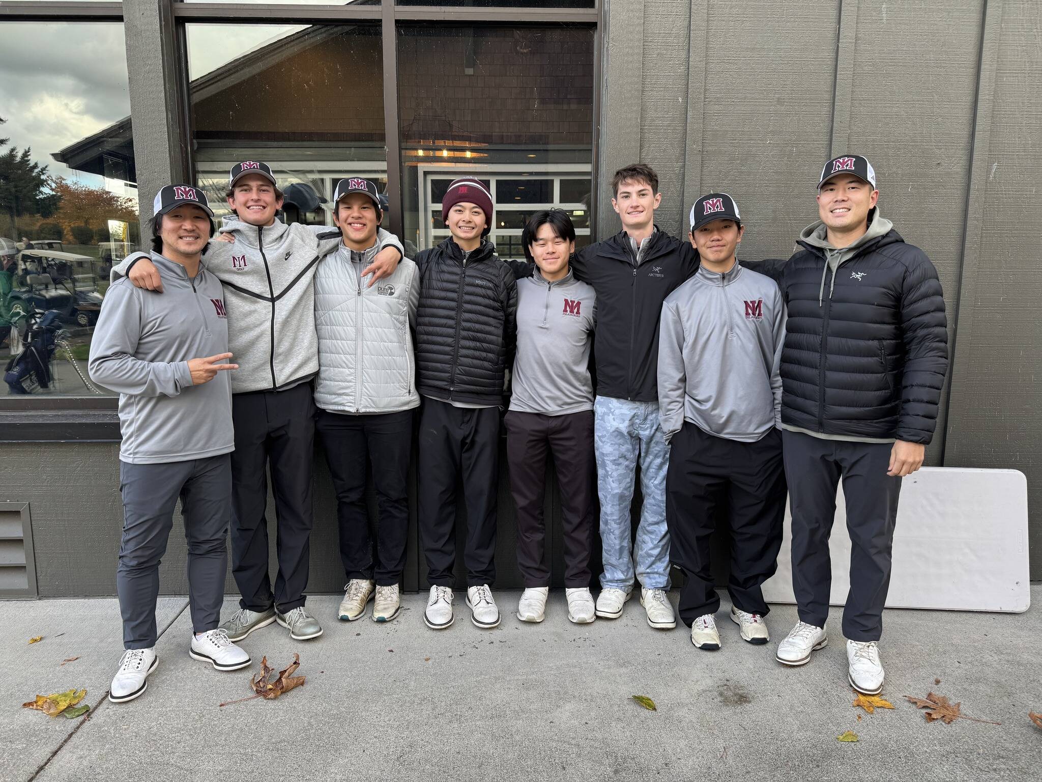 Mercer Island High Schools boys golf team tied for third at the 3A SeaKing District Tournament on Oct. 27 at Druids Glen Golf Club in Covington. The Islanders secured their spot in the state tournament in May by posting one of the five lowest team scores  a 292  in district tournament history. The team finished three under on the 18th hole to qualify for state by a single stroke. Alex Harwood notched second medalist honors with a 67. From left to right (with players scores) is coach Seung Lee, Harwood, Lucas Kornylo (74), Preston Yee (77), Yijoon Seo (74), Alex Brown (83), Alex Guo (79, individual player) and coach Caleb An. Courtesy photo