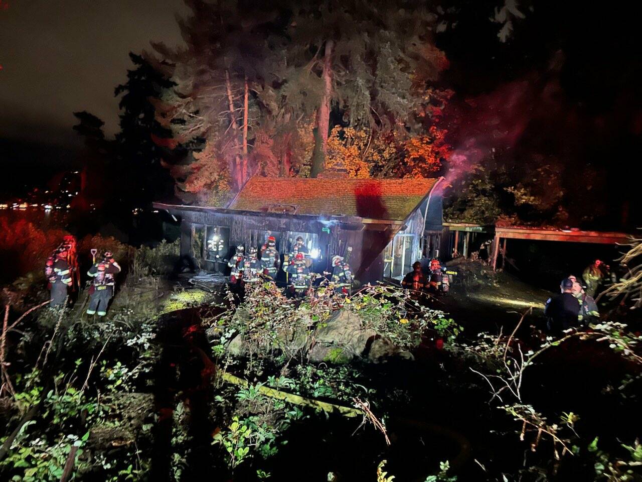 Crews extinguished a Mercer Island residential house fire on the evening of Nov. 10. The structure was unoccupied. Photo courtesy of Eastside Fire & Rescue