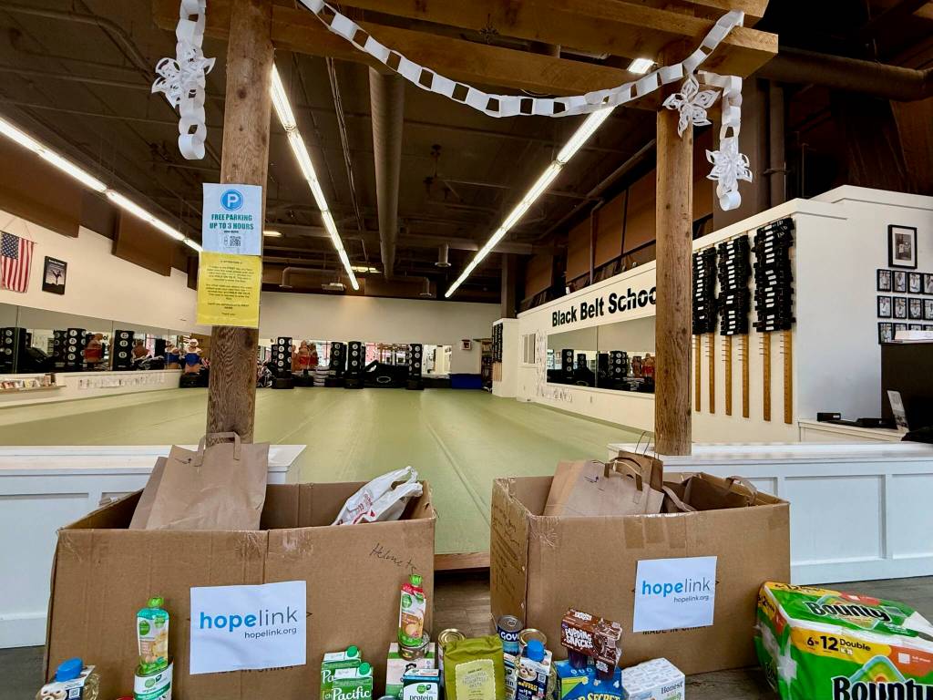 Mercer Island Martial Arts collection bins in front of its dojang archway. Courtesy photo