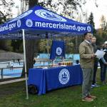 Mercer Island Mayor Salim Nice speaks as Deputy Mayor David Rosenbaum, councilmember Lisa Anderl, incoming councilmember Julie Hsieh and councilmember Daniel Becker listen at the Jake Jacobson Pickleball Courts dedication ceremony on Nov. 18 at Luther Burbank Park. Andy Nystrom/ staff photo