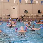 Photo courtesy of the SJCC
Aqua Fit participants get in some lifting during their workout.