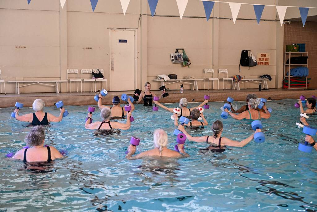 Photo courtesy of the SJCC
Aqua Fit participants get in some lifting during their workout.