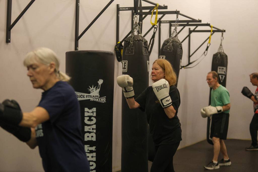 Participants punch away at Rock Steady Boxing. Photo courtesy of the SJCC