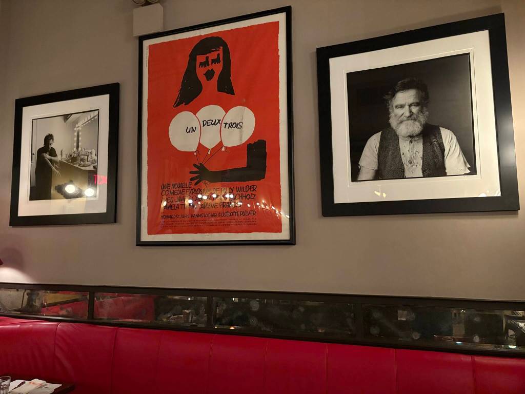 Dine beneath the stars at Café Un Deux Trois. Photo by Mindy Stern