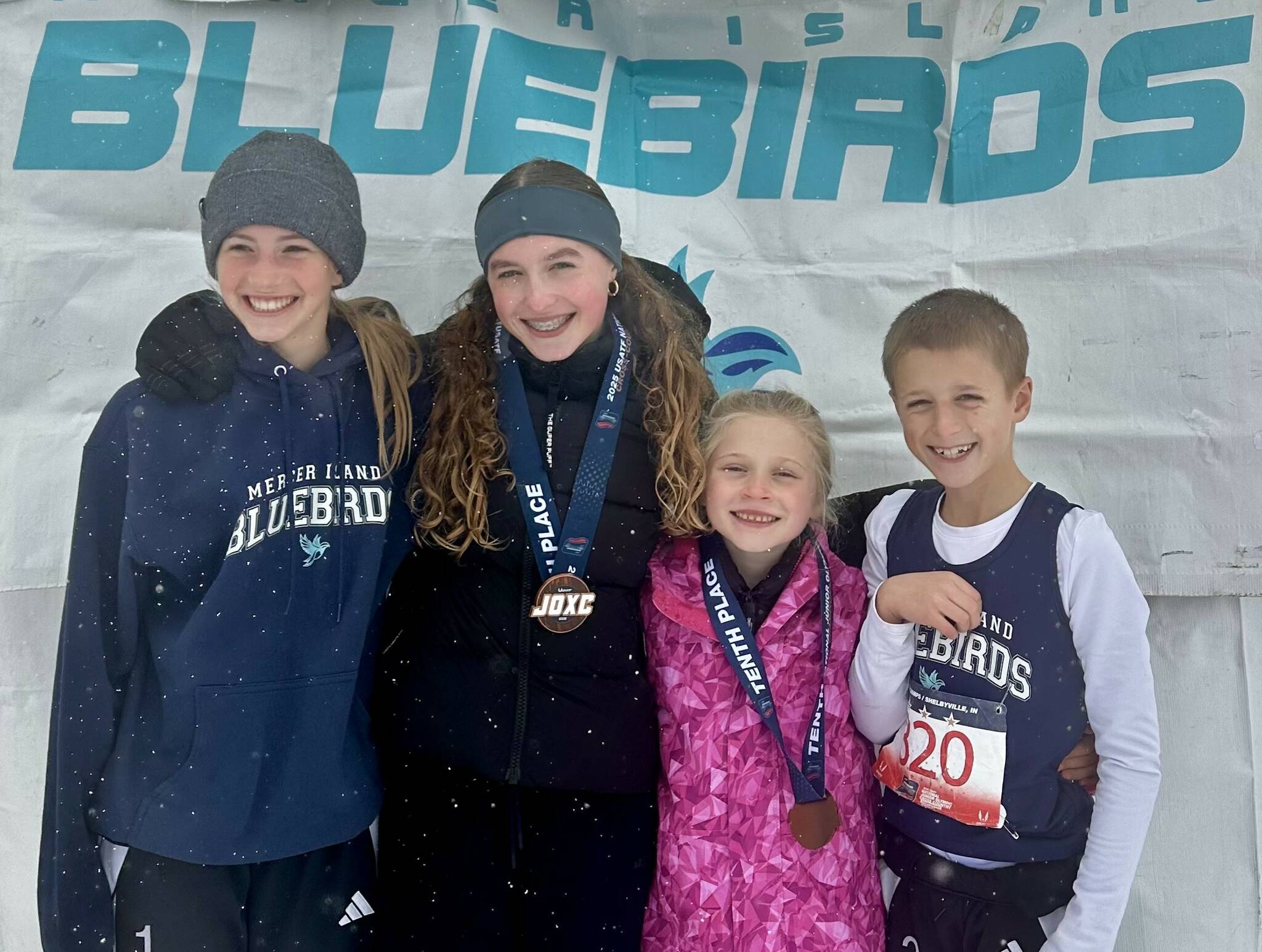 Left to right: Serena Robinson, Beau Berry (11-12 girls 5th place), Ava Olmstead (7-8 girls 10th place) and Aksel Davidson. Courtesy photo