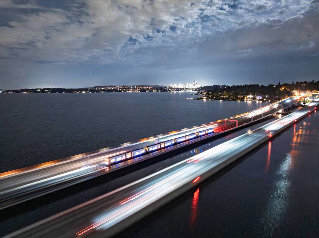 A light rail train crosses the Interstate 90 floating bridge between Mercer Island and Seattle during recent testing. Photo courtesy of Sound Transit
