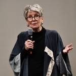 Danielle Cuvilliers longtime friend Sara Cobb speaks at the memorial on Jan. 11. Andy Nystrom/ staff photo