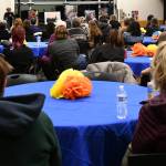 Memorial attendees listen to Sara Cobb speak. Andy Nystrom/ staff photo