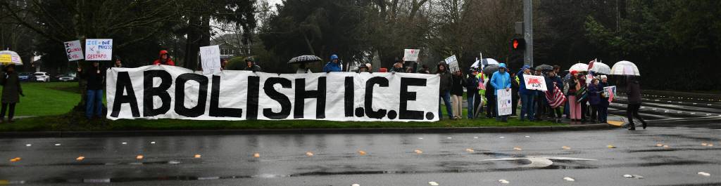 Mercer Islanders led an anti-ICE protest from 3-4 p.m. on Jan. 11 at Island Crest Way and SE 40th Street. Andy Nystrom/ staff photo