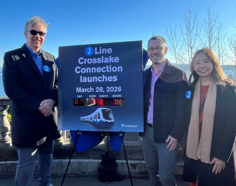 Mercer Island City Councilmembers (from left) Craig Reynolds, Deputy Mayor Daniel Becker and Julie Hsieh attended the Jan. 23 press conference in Seattle regarding the announcement of the March 28 Sound Transit Crosslake Connection light rail opening. Photo courtesy of the city of Mercer Island
