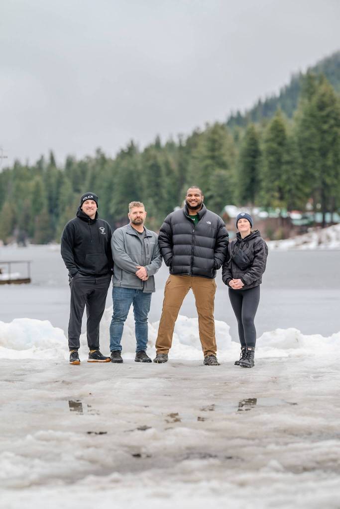 Mercer Island Police Department Marine Patrol Unit members on the site of an ice rescue at Fish Lake in Chelan County on Feb. 3, from left to right: Officer Jordan Tranter, sergeant David Herzog, corporal Kelly Robinson and officer Shannon Johnson. Photo courtesy of the Mercer Island Police Department