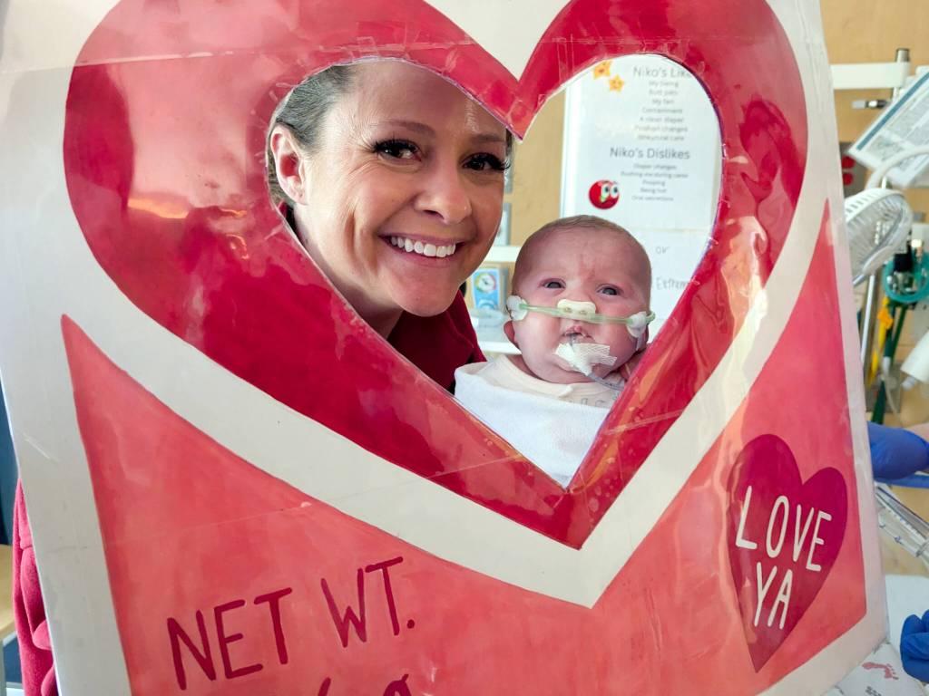 Mercer Islands Lauren Asimakoupoulos and her son Niko Moore during a pre-Valentines Day photo shoot on Feb. 9 at Seattle Childrens Hospital. Photo courtesy of Seattle Childrens Hospital