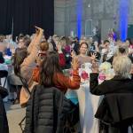 Attendees participate in a demonstration of the Stay Active and Independent for Life (SAIL) class. Photo courtesy of the Mercer Island Youth and Family Services Foundation