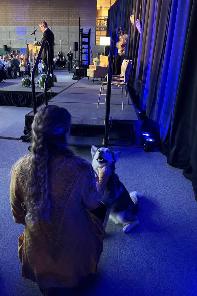 Mercer Island Youth and Family Services counselor Corinne Alef with therapy dog Marshmallow behind the scenes at the Mercer Island Youth and Family Services Foundations annual fundraising breakfast on Feb. 11 at the Mercer Island Community and Event Center. Photo courtesy of the Mercer Island Youth and Family Services Foundation
