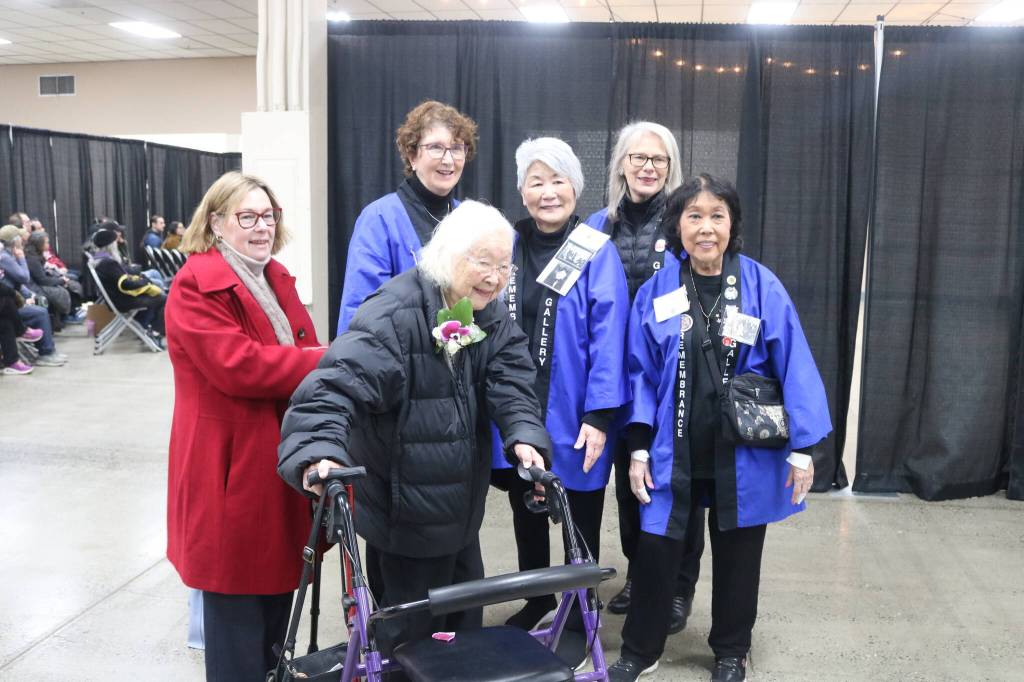 Federal Way City Council president Susan Honda stands with her mother-in-law, Charlene Honda, who is a survivor, together with members of the Puyallup Valley JACL. Photo by Bailey Jo Josie/Sound Publishing