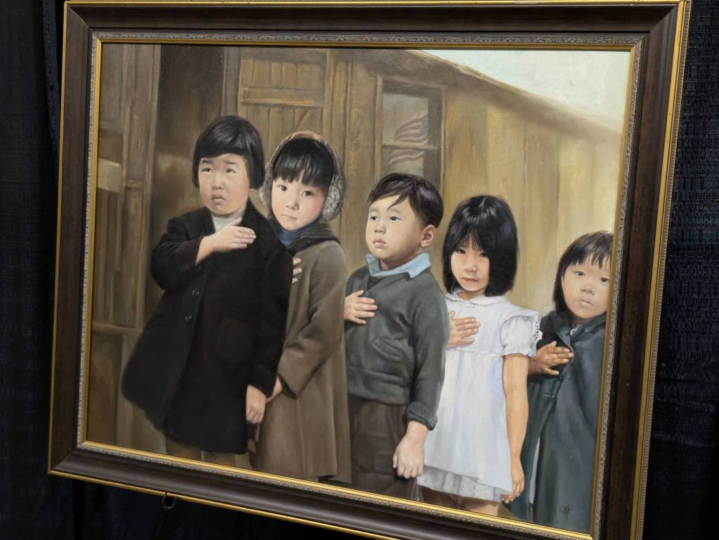 Children were among those imprisoned because of their nationality and ethnicity during WWII in the United States, as shown in this painting by Chris Hopkins. Photo by Bailey Jo Josie/Sound Publishing