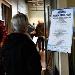 Checking out the booth lineup. Andy Nystrom/ staff photo