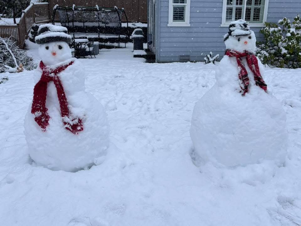 A pair of people made of snow in Snoqualmie on March 13. Photo courtesy of Kari Wahlstrom Collins