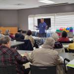 Presenter Ben Solomon teaches seniors about home care during an ElderMove Alliance seminar at Peter Kirk Senior Center in Kirkland. Courtesy photo