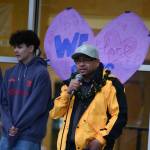 Jon Madamba speaks at a vigil for his son, Rhys, who passed away on March 14. The gathering was held on March 19 at the Mercer Island High School amphitheater. Also pictured is Rhyss best friend Louis Garry. Andy Nystrom/ staff photo