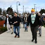 People hurry to the Mercer Island Station on March 28 to take some of the first light rail trips from the Island. Andy Nystrom/ staff photo