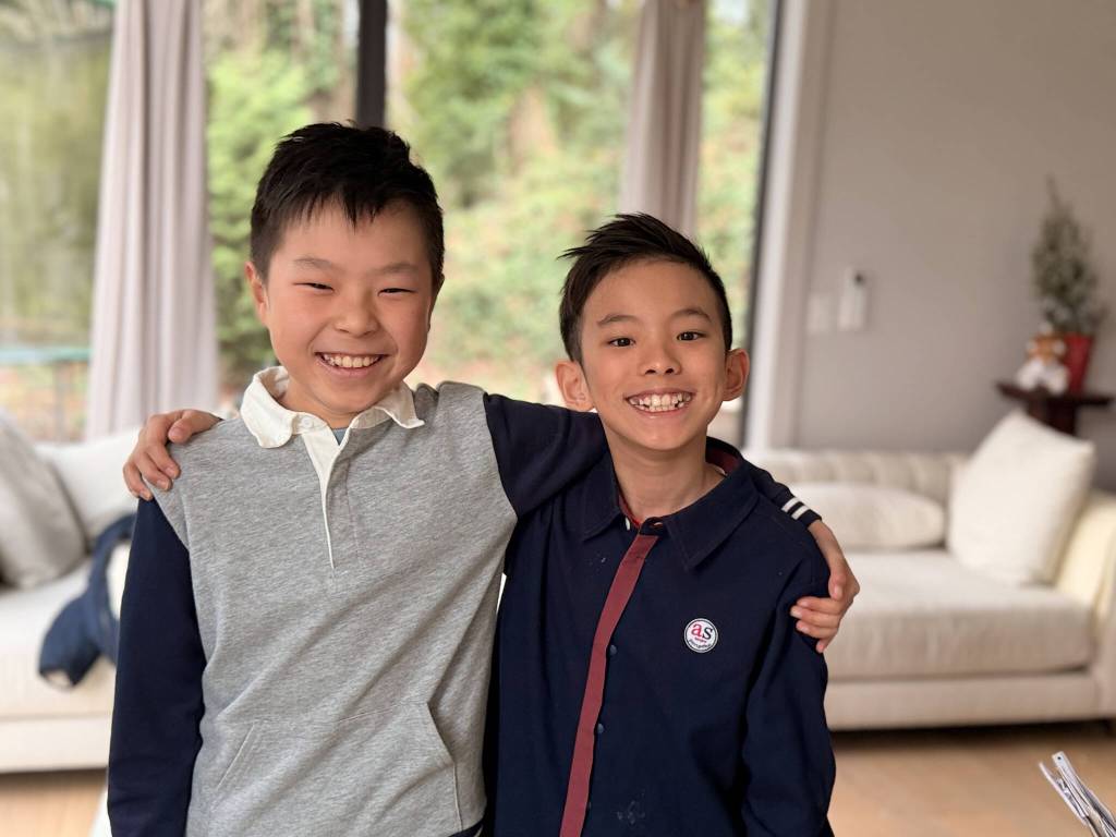 Lakeridge Elementary School students are, from left, Henry Guo (third-grader) and Jacob Yip (fourth-grader). The Lion Noise Meter app builders were named Washington state winners in the elementary track two division in the 2026 Presidential AI Challenge. Courtesy photo
