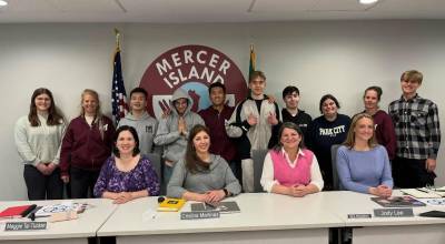 The Mercer Island High School Unified basketball team joined school board members at the April 23 meeting. Photo courtesy of the Mercer Island School District