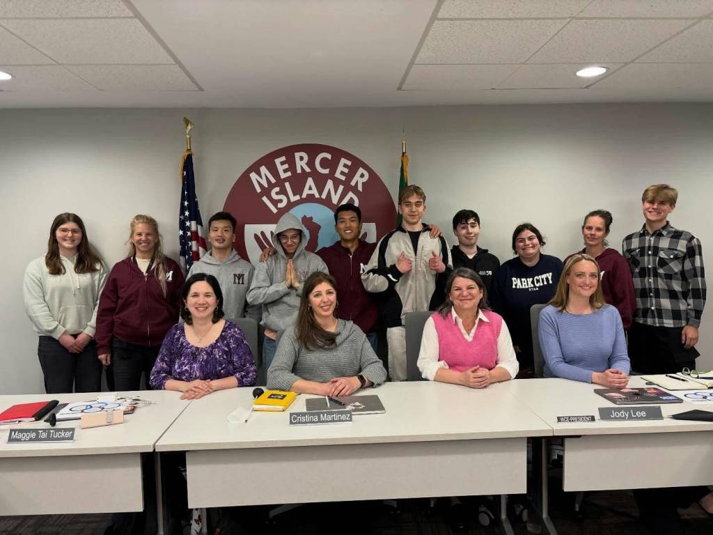 The Mercer Island High School Unified basketball team joined school board members at the April 23 meeting. Photo courtesy of the Mercer Island School District