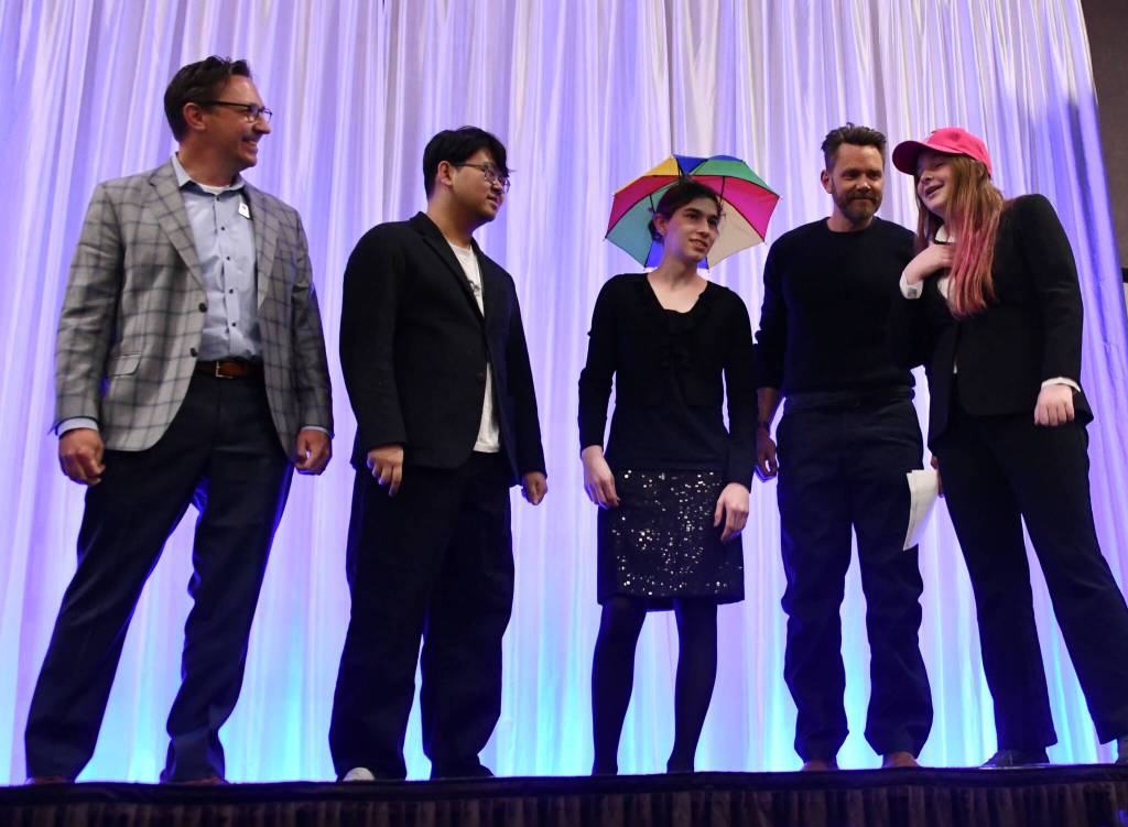 Mercer Island High School Drama students Tiger Yang, Luthien Finch and Anya Sobel perform improv at the breakfast along with special guests Dr. Fred Rundle and Joel McHale. Andy Nystrom/ staff photo