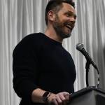 Joel McHale entertains the crowd as emcee of the Mercer Island Schools Foundation annual fundraising Breakfast of Champions on April 28 in the Mercer Island High School gym. Andy Nystrom/ staff photo