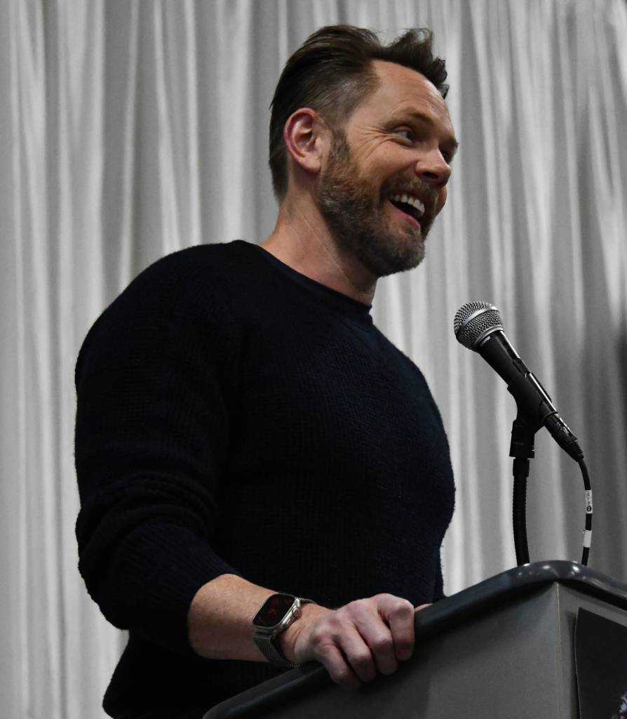 Joel McHale entertains the crowd as emcee of the Mercer Island Schools Foundation annual fundraising Breakfast of Champions on April 28 in the Mercer Island High School gym. Andy Nystrom/ staff photo
