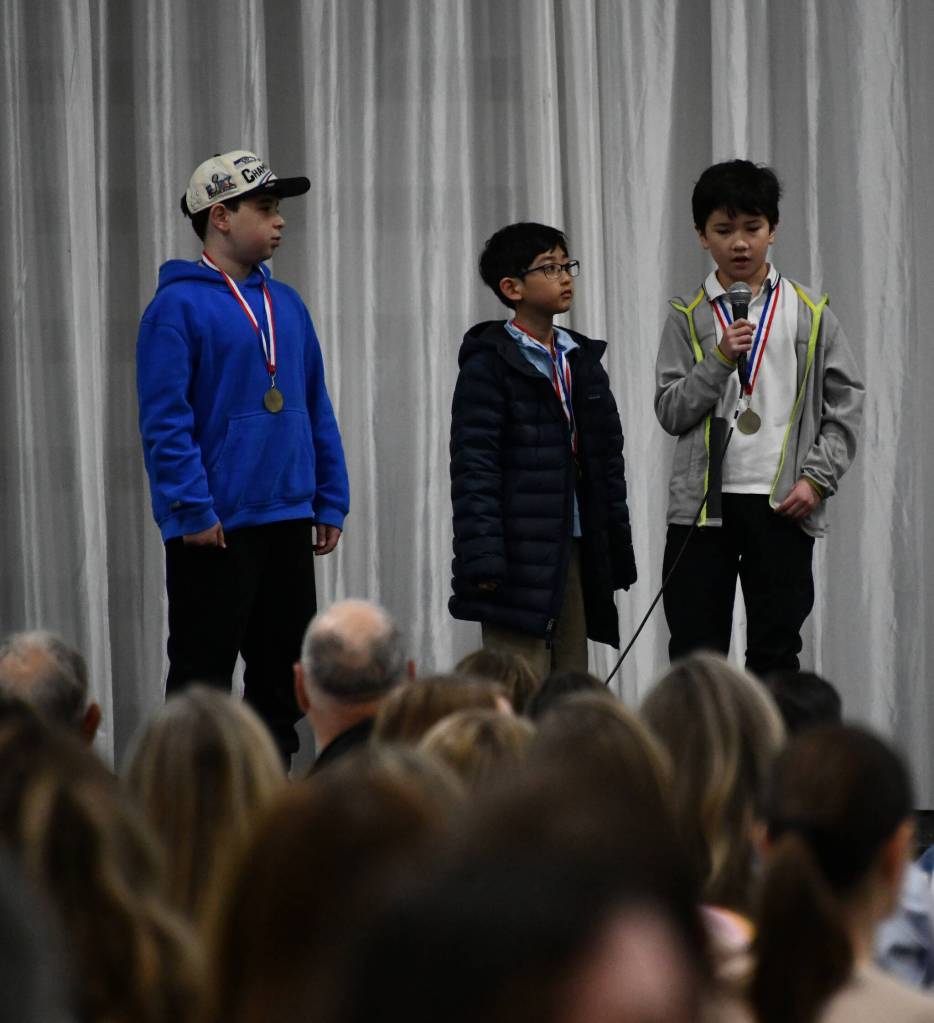 Northwood Elementary School spelling champs Mason Park, Isaac Freedman and Toby Stoffer discuss their competition experiences at the breakfast. Andy Nystrom/ staff photo