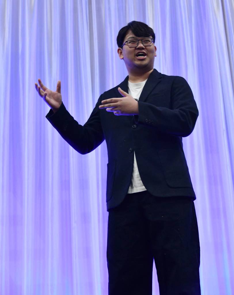 Tiger Yang addresses the crowd. Andy Nystrom/ staff photo