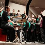Artistic Director Paul Caldwell leads the Seattle Mens Chorus through its performance on May 5 at the Mercer Island High School Performing Arts Center. Andy Nystrom/ staff photo