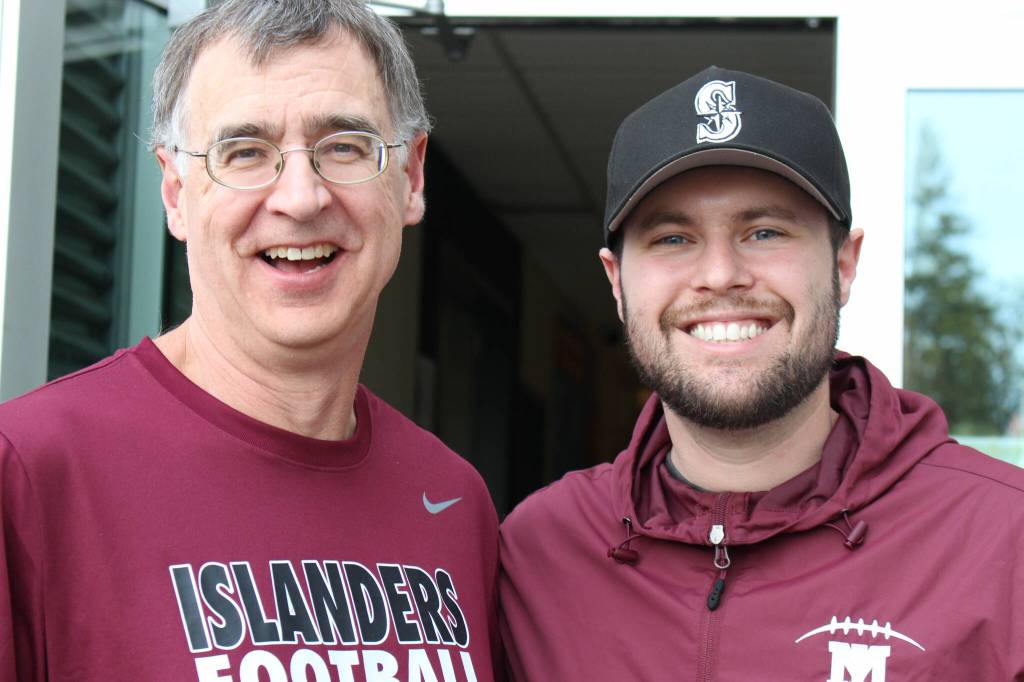 New Mercer Island High School varsity head football coach Mason Azose, right, along with Ross Heise, Azoses friend, former coach, assistant coach, and one of the men responsible for encouraging him to coach. Courtesy photo