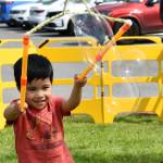 Gideon Rosete, 3, plays with bubbles at the Mercer Island PTAs Special Services and Learning Differences (SSALD) Groups third annual Community Day of Inclusion on May 9 at the Northwood Elementary School lower parking lot. The free event for every family and every ability, according to a flier, featured: touch-a-truck with police cars, school buses and first responders; adaptive dance with Creation Dance Studio; adaptive bikes; activity stations with creative art, bubbles and play stations for all ages; resource fair with organizations that support kids with special needs and their families; bounce house and more. Andy Nystrom/ staff photo