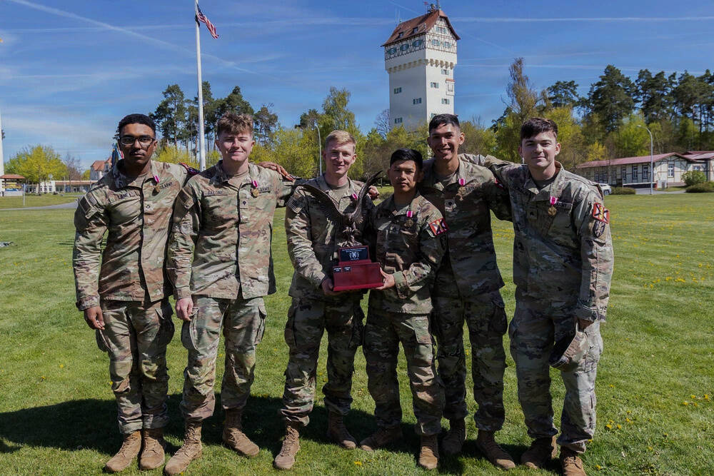 First Lt. Benjamin Flaherty of Mercer Island (third from left), stands with Staff Sgt. Jonah Mang, Sgt. Marcus Robinson, Spc. Pedro Cardona, Spc. Matthew Falone and Pfc. Cleopheus Lane of the 7th Engineer Brigade after being named the winning squad of the 2026 Best Squad Competition hosted by the 21st Theater Sustainment Command at the Grafenwöhr Training Area, Germany, on April 24. Photo courtesy of United States Army Staff Sgt. Daniel Yeadon