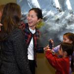 Fan Yuan shares a laugh with Mercer Island City Councilmember Julie Hsieh and Yuans daughters, Kara and Rya Sloan. Photo courtesy of the city of Mercer Island
