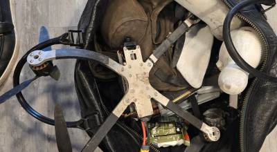 A bag of items from the front lines of the Ukraine War, including a Russian drone. Photo by Keelin Everly-Lang / the Mirror.