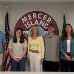 Mercer Island School District 2026 Pathfinder Award recipient Mary Wayte, center, with the school board at its May 28 meeting. Photo courtesy of the Mercer Island School District