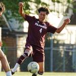 Mercer Island High School junior Jesus Aquino goes for the ball in the state final. Photo courtesy of Ari Stoffer