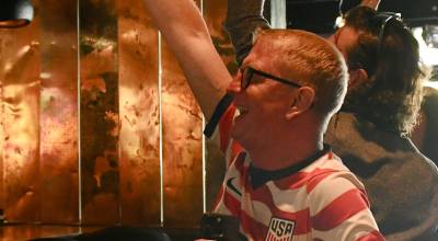 Erik Anderson cheers for a United States World Cup goal at The Crawlspace Gastropub on Mercer Island on June 19. Andy Nystrom/ staff photo