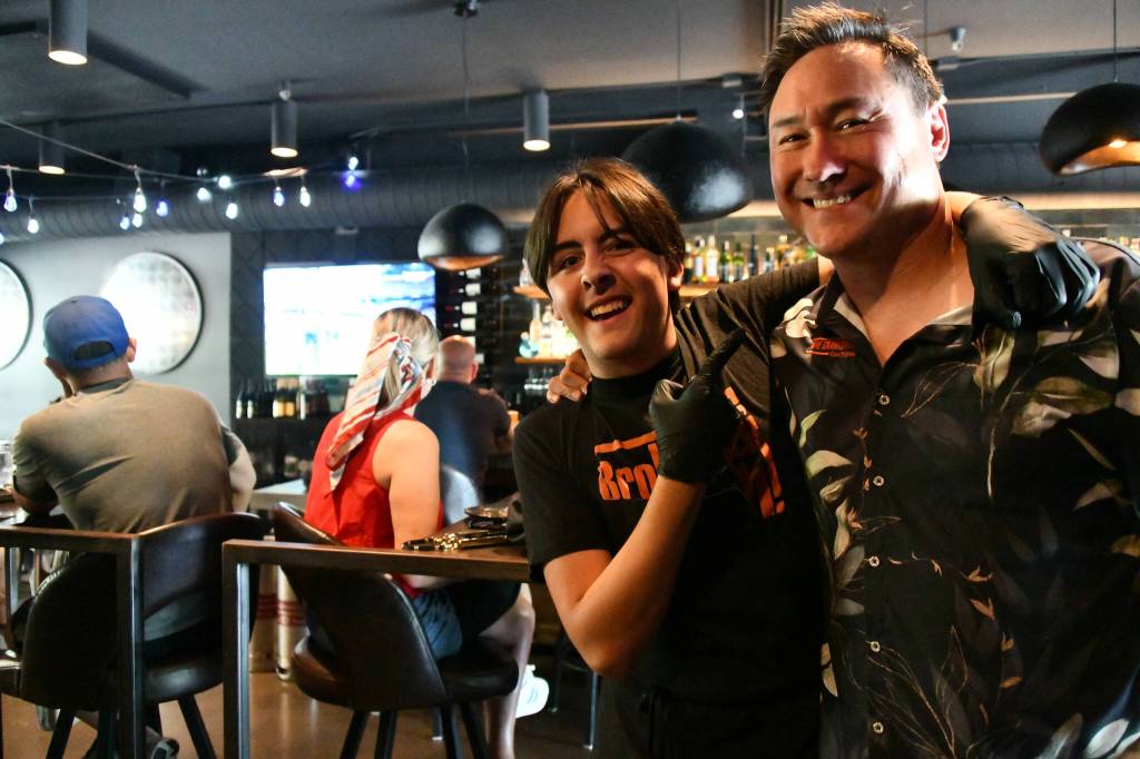 William Farrish and his dad Jason, co-owner of The Crawlspace Gastropub. Andy Nystrom/ staff photo