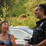 Mercer Islander Tina Terada visits with Mercer Island Police Department Cpl. Bobby Jira on Aug. 4 at a National Night Out gathering. Andy Nystrom/ staff photo